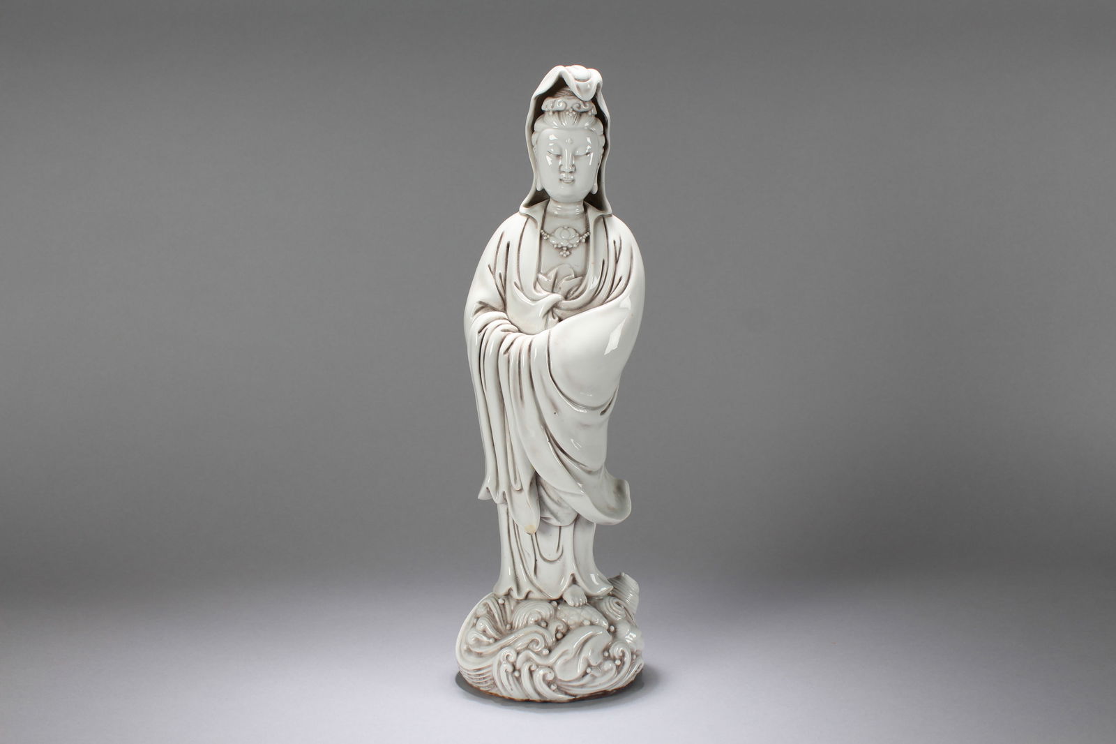 A Chinese Religious De Blac Porcelain Fortune Statue: A Chinese Religious De Blac Porcelain Fortune Statue. Height: 14 (inch). Width: 4 (inch).