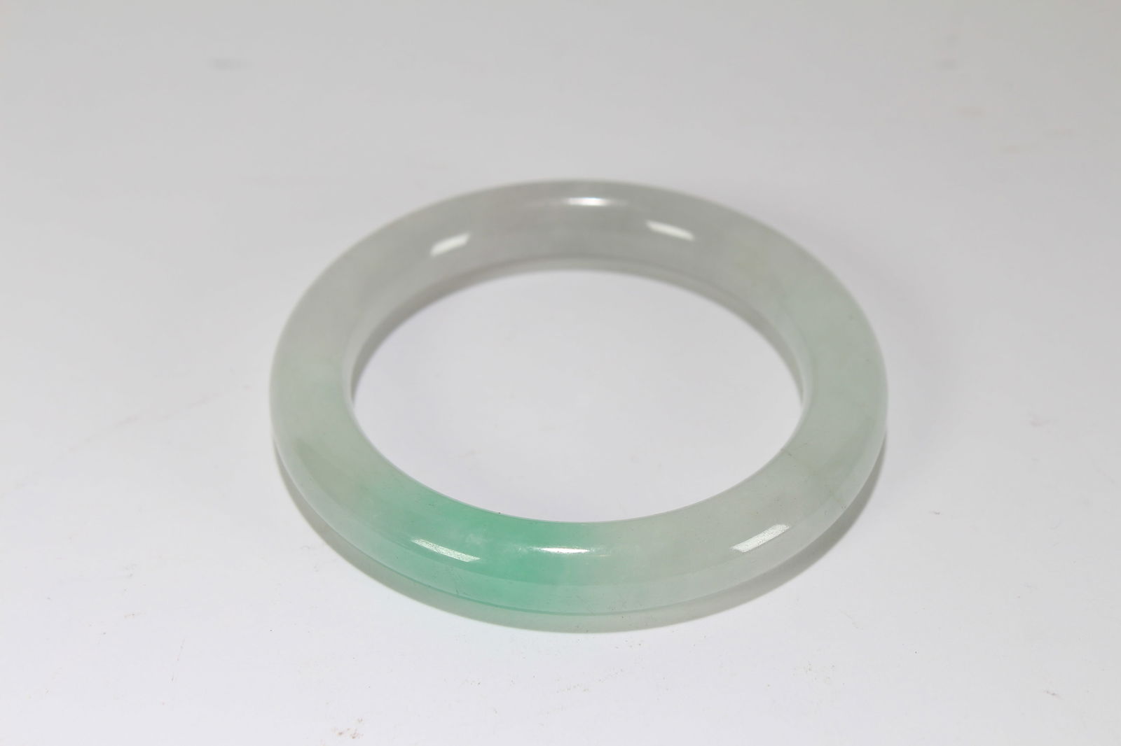 A Chinese Fortune Bangle: A Chinese Fortune Bangle. Opening Diameter: 3 (inch).