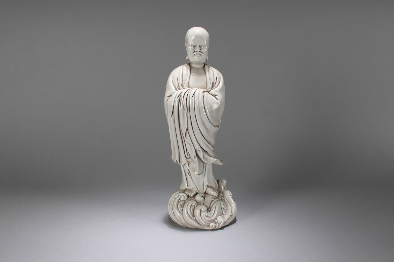 A Chinese Religious De Blac Porcelain Fortune Buddha Statue: A Chinese Religious De Blac Porcelain Fortune Buddha Statue. Height: 13 (inch). Width: 4.5 (inch)
