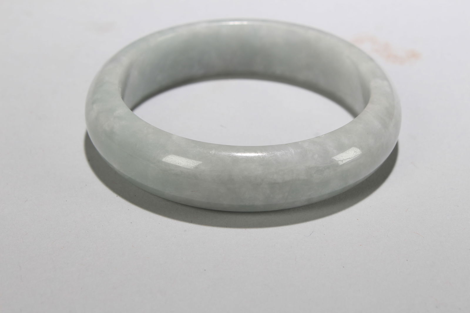 A Chinese Fortune Bangle: A Chinese Fortune Bangle. Opening Diameter: 2.75 (inch).