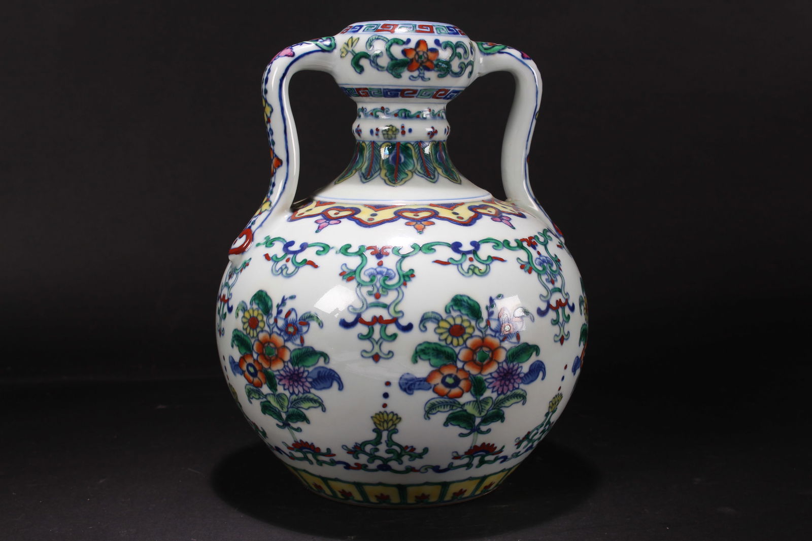 A Chinese Duo-handled Nature-sceen Porcelain Vase: A Chinese Duo-handled Nature-sceen Porcelain Vase. Height: 9.75 (inch).