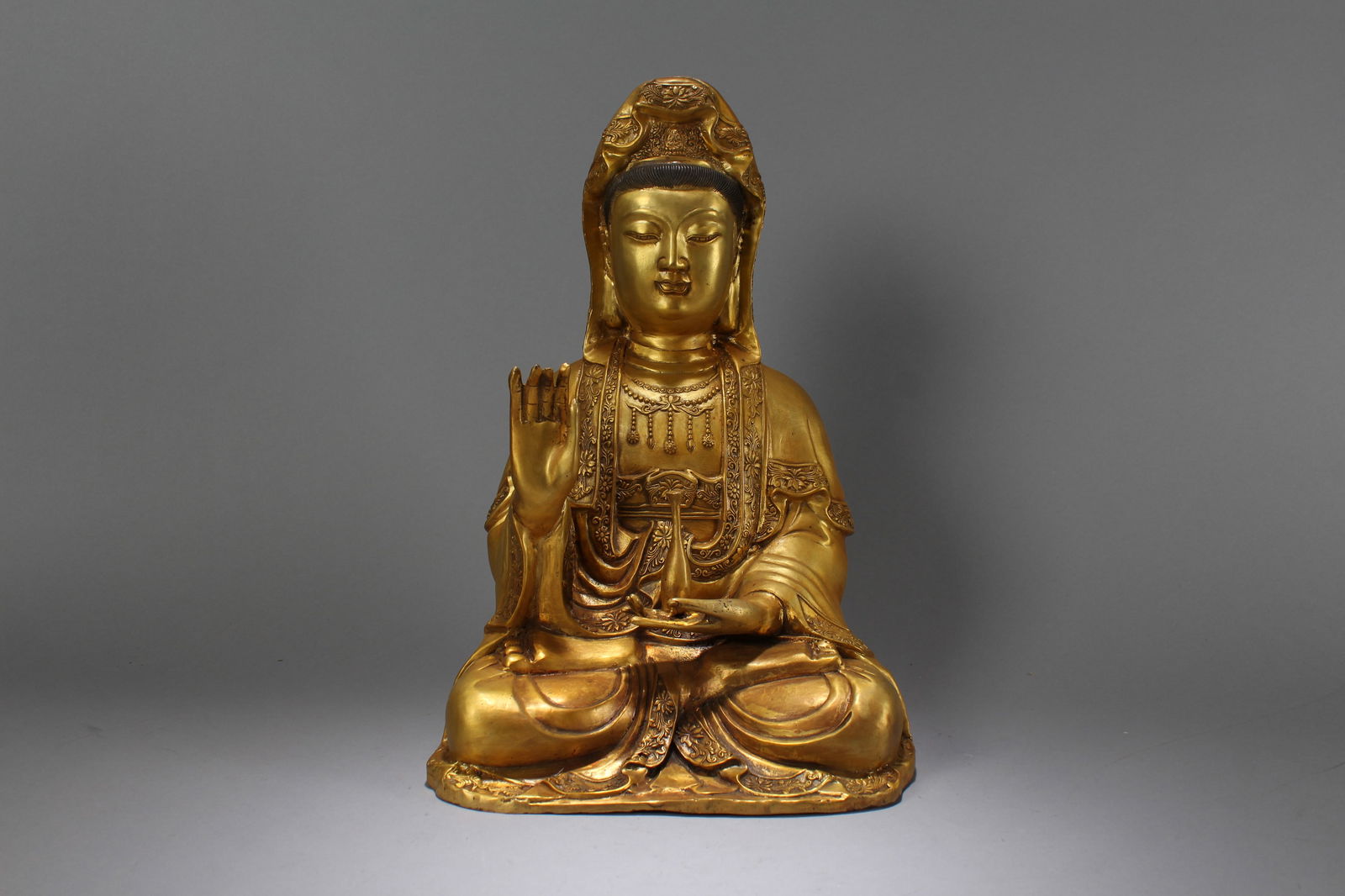 A Chinese Religious Gilt Pondering-pose Fortune Buddha Statue: A Chinese Religious Gilt Pondering-pose Fortune Buddha Statue. Height: 18 (inch). Width: 10.5 (inch). Length: 7 (inch)