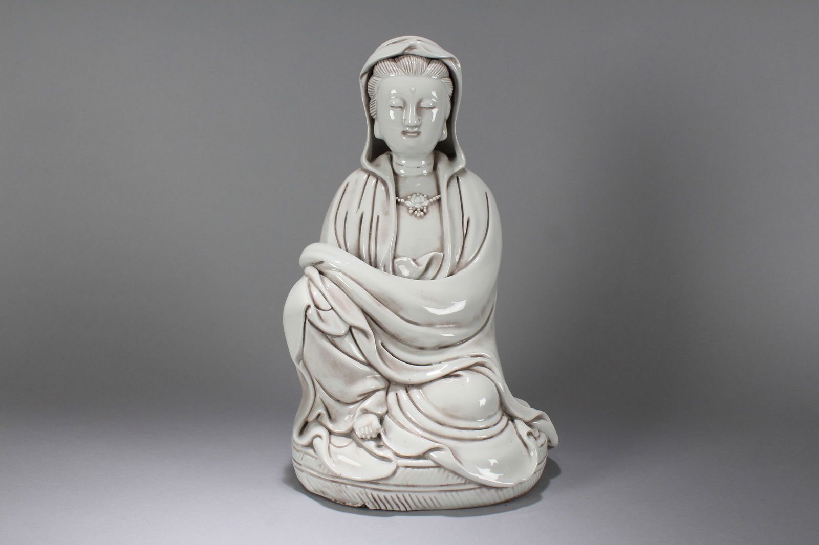 A Chinese Religious Porcelain Fortune Buddha Statue (1 of 5)