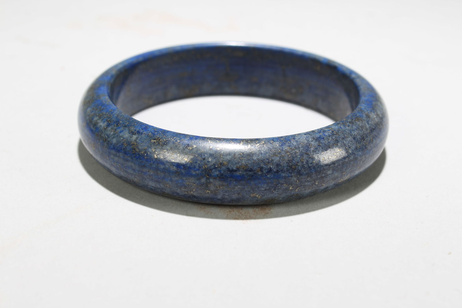 A Chinese Fortune Bangle: A Chinese Fortune Bangle. Opening Diameter: 2.75 (inch).