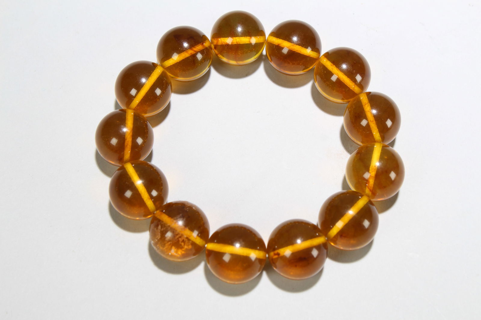 A Chinese Bracelet Display: A Chinese Bracelet Display . Width: 0.75 (inch).