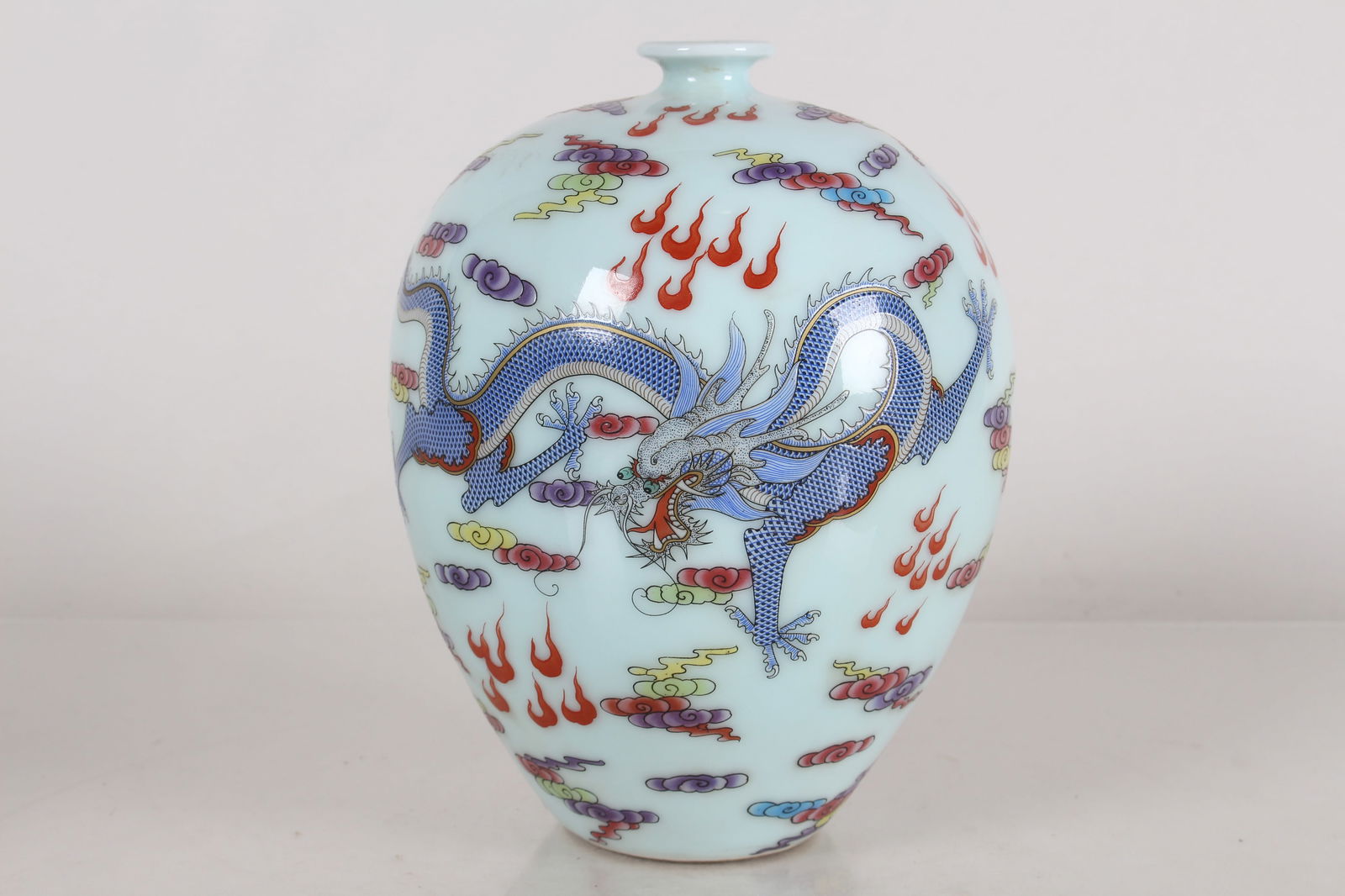 A Chinese Dragon-decorating Porcelain Fortune Vase: A Chinese Dragon-decorating Porcelain Fortune Vase . Height: 7 (inch).