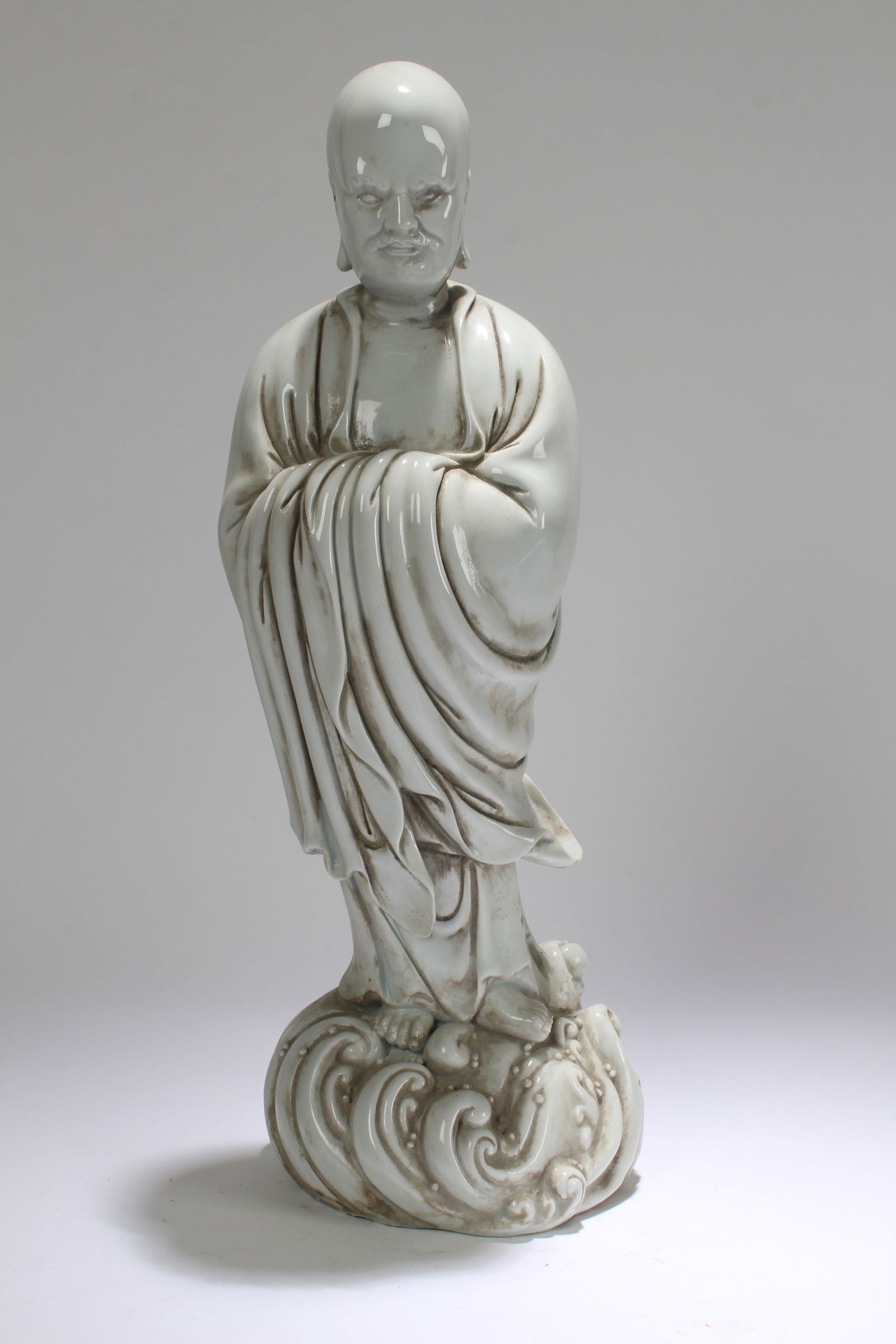A Chinese White Porcelain Buddha Statue: A Chinese White Porcelain Buddha Statue . Height: 15 (inch).