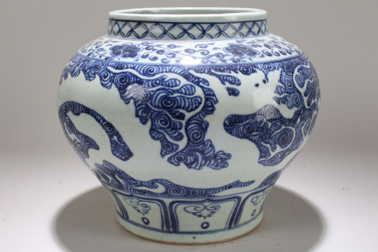A Chinese Blue and White Dragon-decorating Porcelain Fortune Circular Vase: A Chinese Blue and White Dragon-decorating Porcelain Fortune Circular Vase . Height: 8 (inch). Opening Diameter: 9.5 (inch).
