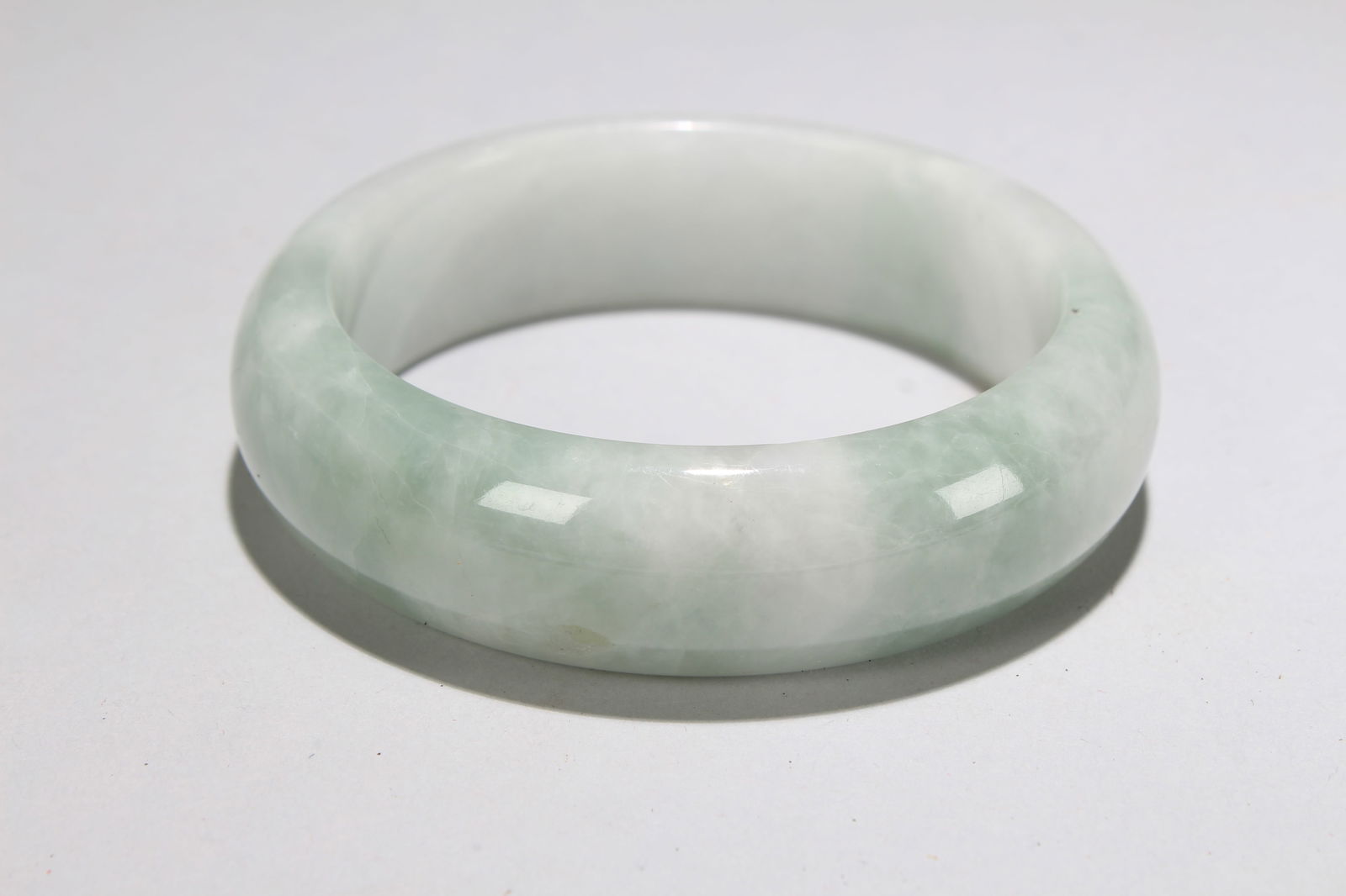 A Chinese Bangel Display: A Chinese Bangel Display . Opening Diameter: 2.75 (inch).