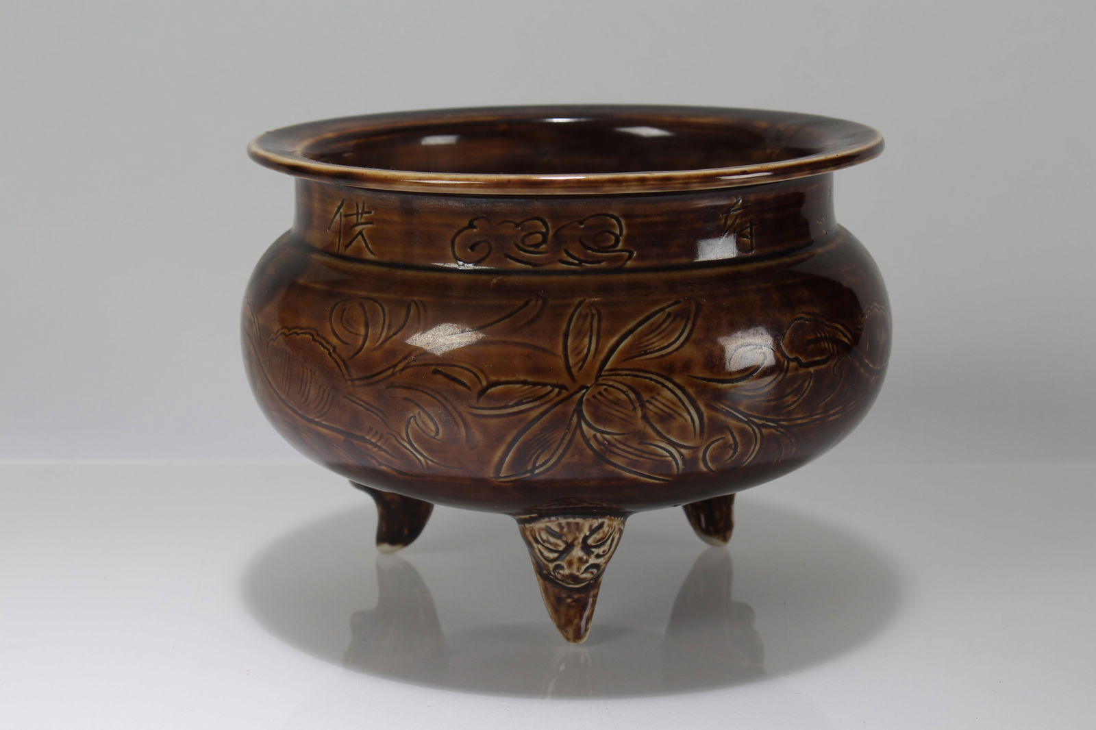 A Chinese Tri-podded Porcelain Fortune Censer: A Chinese Tri-podded Porcelain Fortune Censer . Height: 4.5 (inch).