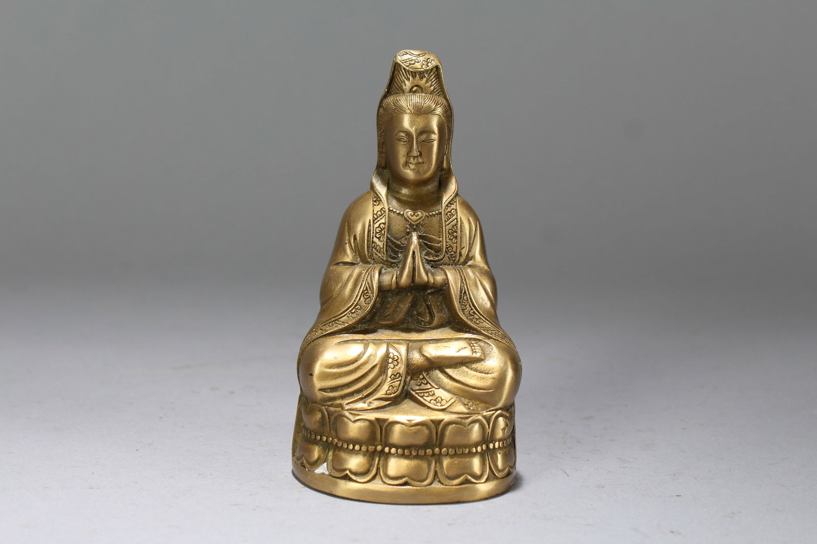 A Chinese Religious Gilt Fortune Buddha Statue: A Chinese Religious Gilt Fortune Buddha Statue. Height: 4.75 (inch). Length: 2.5 (inch). Width: 2 (inch).