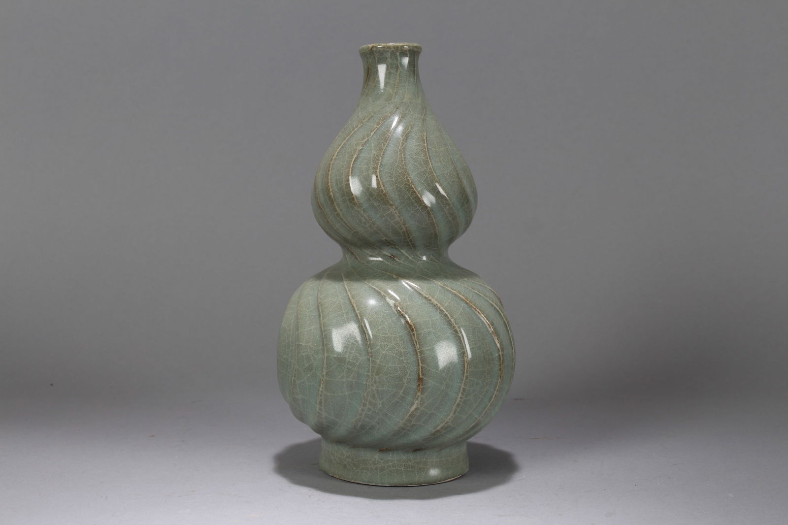 A Chinese Calabash-fortune Detailed Porcelain Vase: A Chinese Calabash-fortune Detailed Porcelain Vase. Height: 9.5 (inch). Width: 5 (inch).