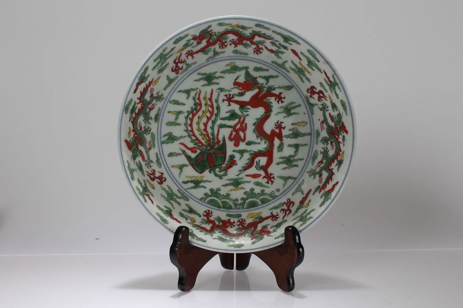 A Chinese Dragon-decorating Porcelain Fortune Plate: A Chinese Dragon-decorating Porcelain Fortune Plate. Height: 1.75 (inch). Opening Diameter: 10 (inch).