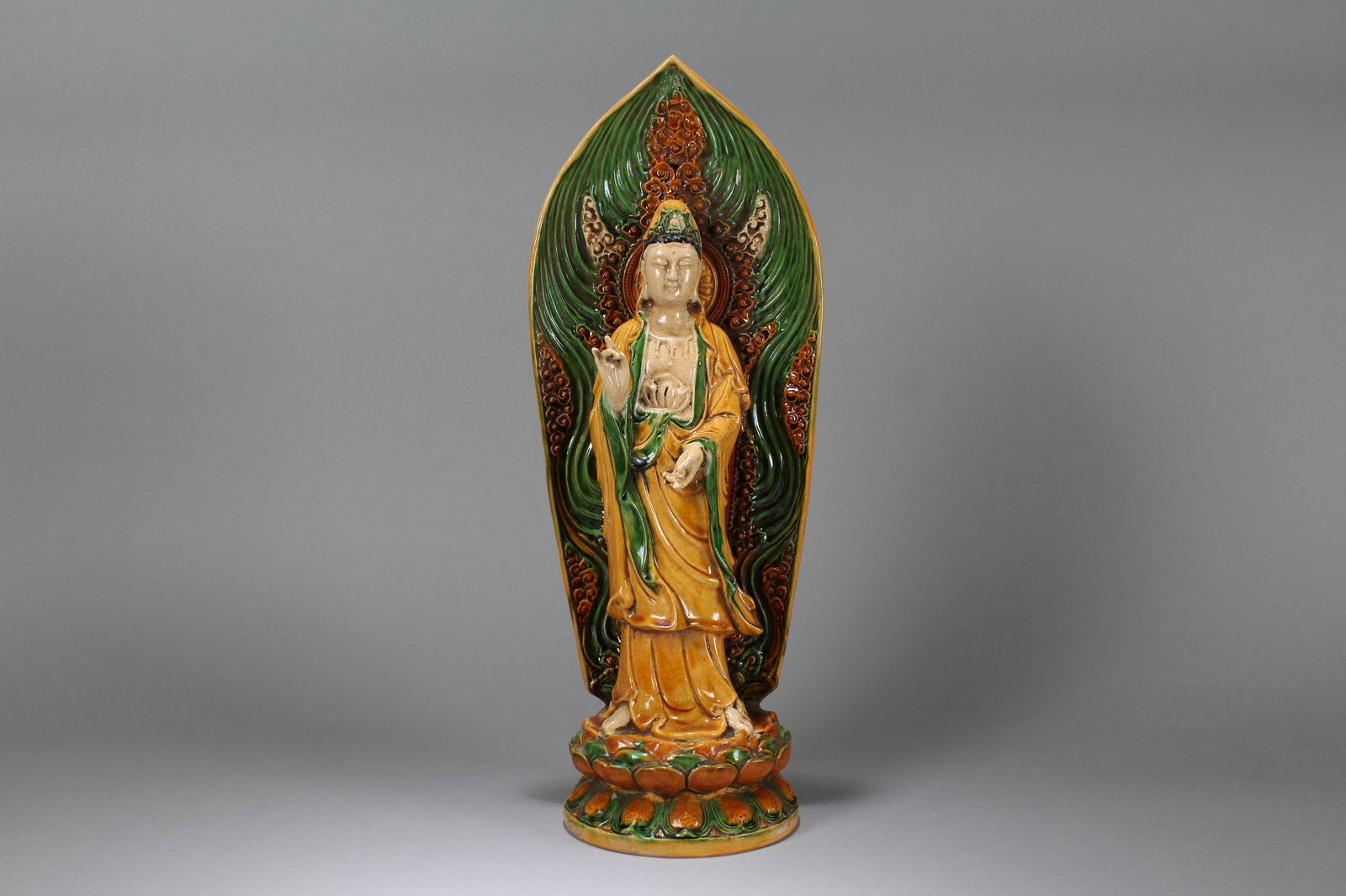 A Chinese Duo-handling Porcelain Fortune Vase: A Chinese Religious Porcelain Fortune Buddha Statue. Height: 17 (inch). Opening Diameter: 5 (inch)
