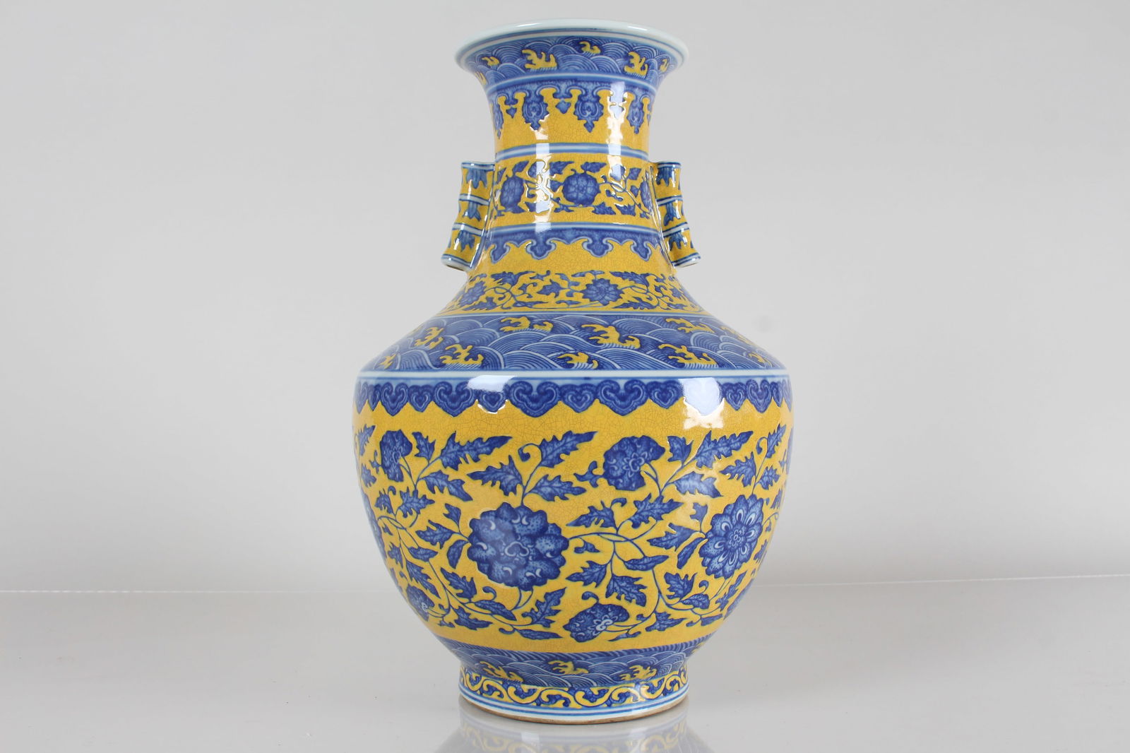 A Chinese Duo-handled Yellow-coding Porcelain Fortune Vase: A Chinese Duo-handled Yellow-coding Porcelain Fortune Vase . Height: 13.5 (inch).