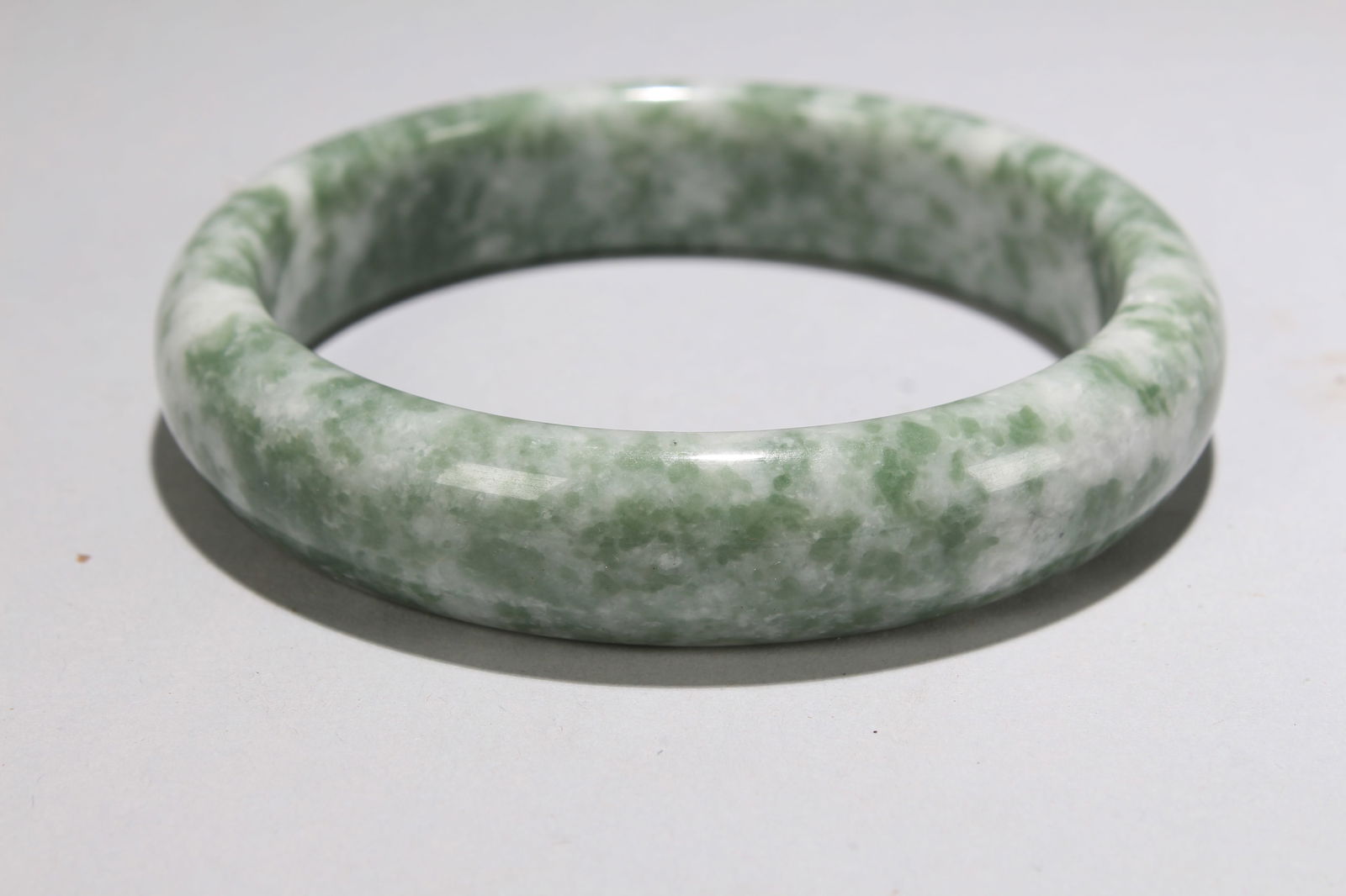 A Chinese Bangel Display: A Chinese Bangel Display . Opening Diameter: 3 (inch).