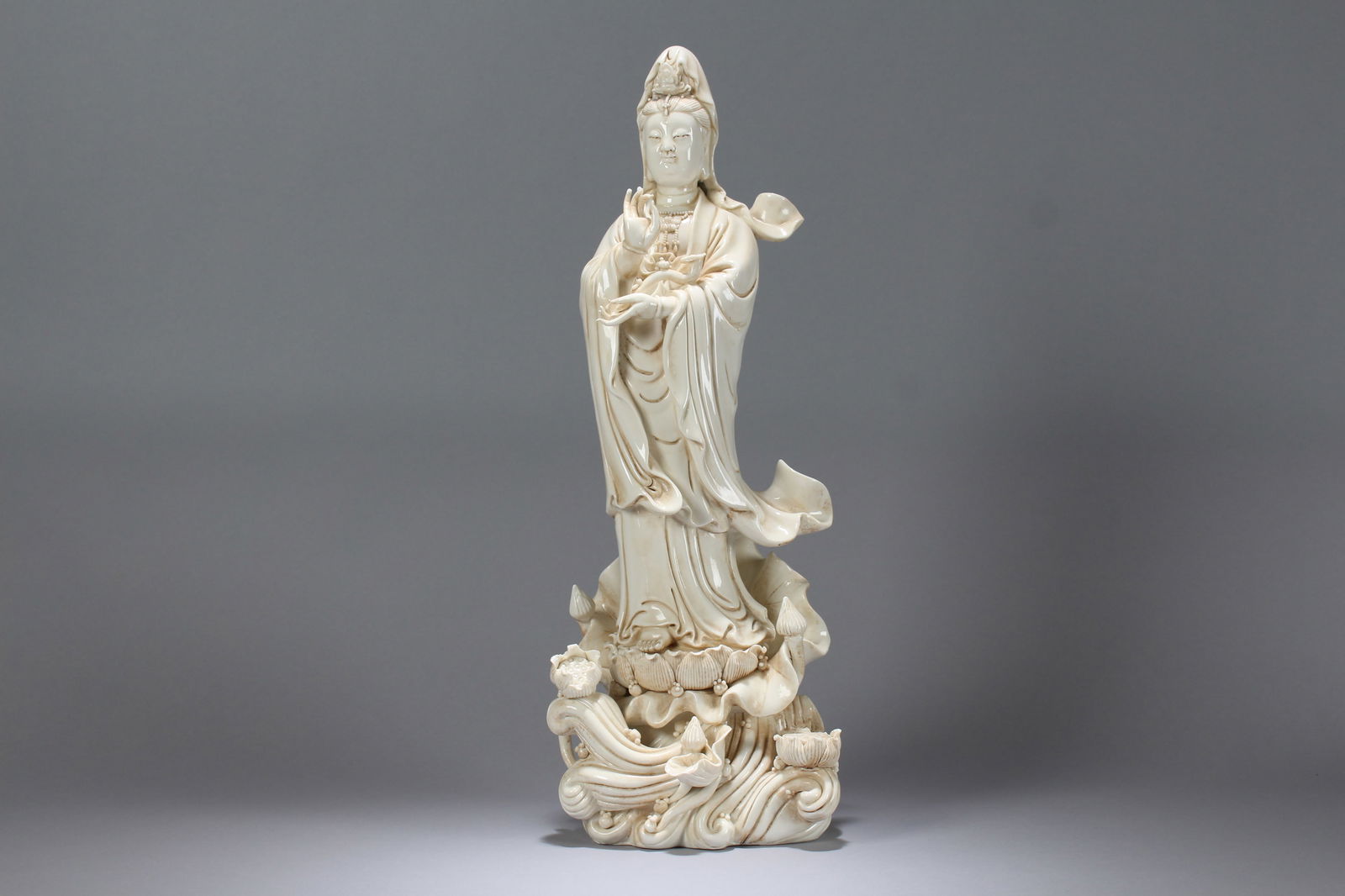 A Chinese Massive Vividly-detailed De Blac Religious Porcelain Statue: A Chinese Massive Vividly-detailed De Blac Religious Porcelain Statue. Height: 19.75 (inch). Length: 7 (inch). Width: 5 (inch).