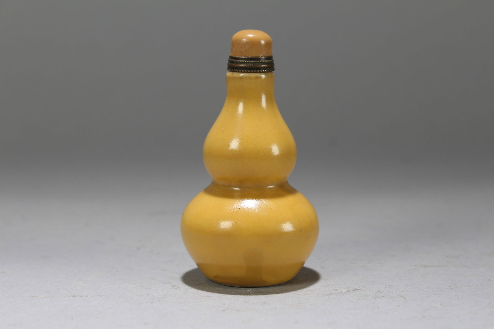 A Chinese Yellow-coding Fortune Snuff Bottle: A Chinese Yellow-coding Fortune Snuff Bottle. Height: 3 (inch). Width: 1.75 (inch).