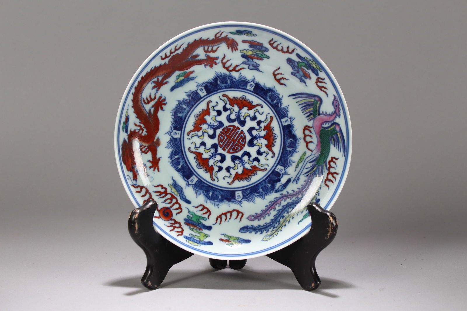 A Chinese Dragon-phoenix Porcelain Fortune Plate: A Chinese Dragon-phoenix Porcelain Fortune Plate. Height: 1.5 (inch). Opening Diameter: 7.75 (inch).