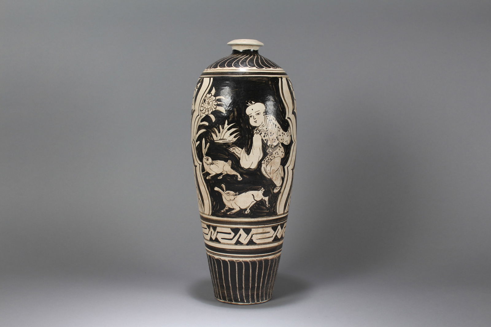 A Chinese Religious Porcelain Fortune Pillow Stand: A Chinese Joyful-kid Porcelain Fortune Vase. Height: 15.75 (inch). Opening Diameter: 6 (inch)