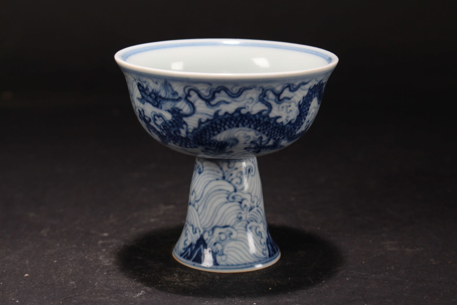 A Chinese Dragon-decorating Porcelain Fortune Cup: A Chinese Dragon-decorating Porcelain Fortune Cup. Height: 3.5 (inch). Opening Diameter: 3.5 (inch).