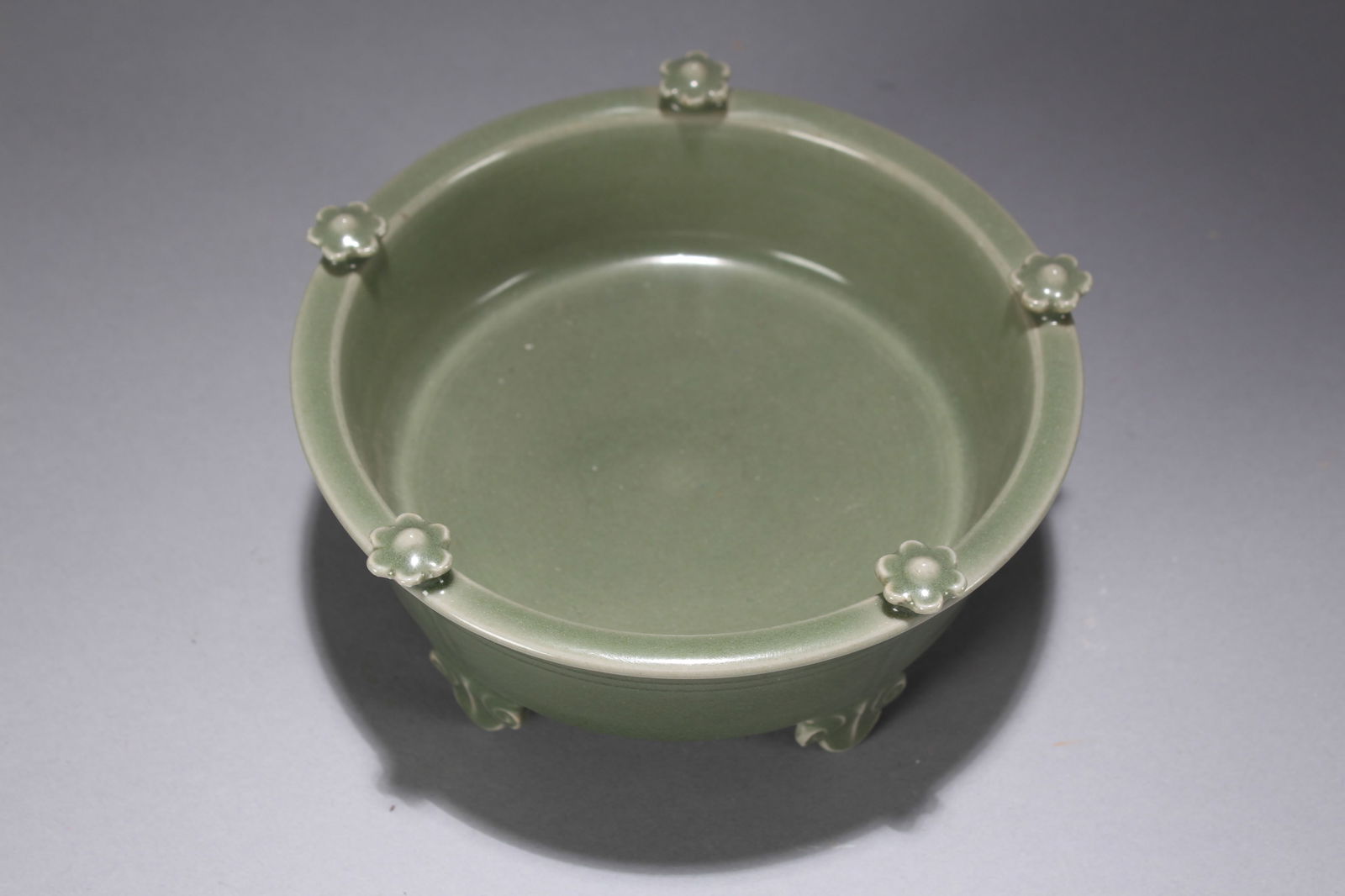 A Chinese Vividly-detailed Tri-podded Porcelain Fortune Censer: A Chinese Vividly-detailed Tri-podded Porcelain Fortune Censer. Height: 2.75 (inch). Width: 6.25 (inch).