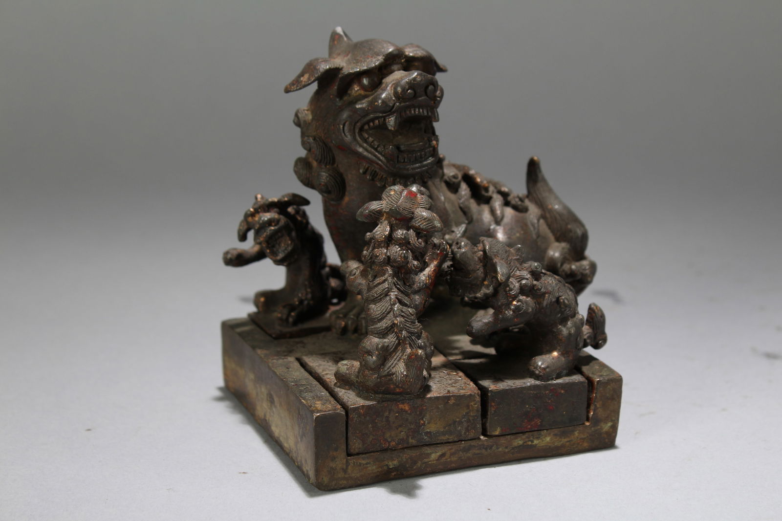 A Chinese Square-based Religious Myth-beast Statue: A Chinese Square-based Religious Myth-beast Statue. Height : 4.75 (inch). Width : 4.4 (inch). Length : 4.25 (inch).