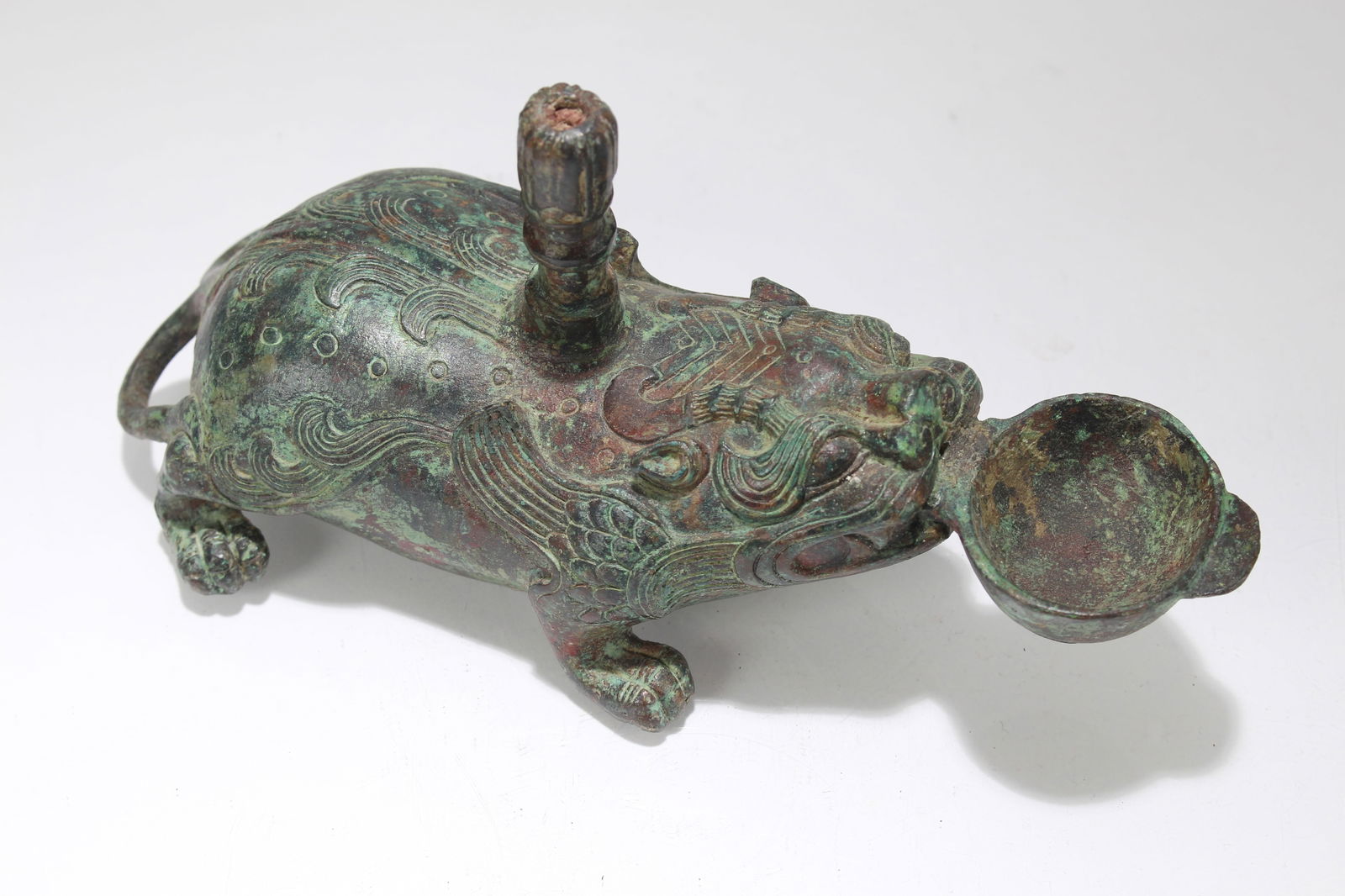 A Chinese Anicent-framing Bronze Vessel: A Chinese Anicent-framing Bronze Vessel. Height: 4 (inch). Length: 8.5 (inch).