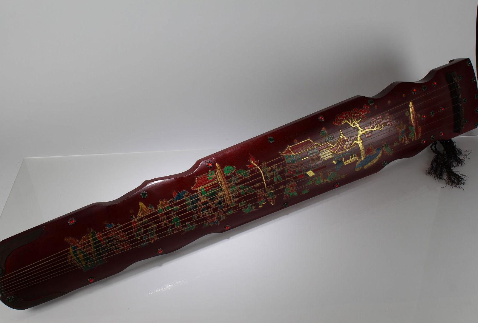 A Chinese Poetry-framing 7-string Guzheng. Height: 3.7 (inch). Length: 48 (inch). Width: 7.5 (inch). (1 of 10)