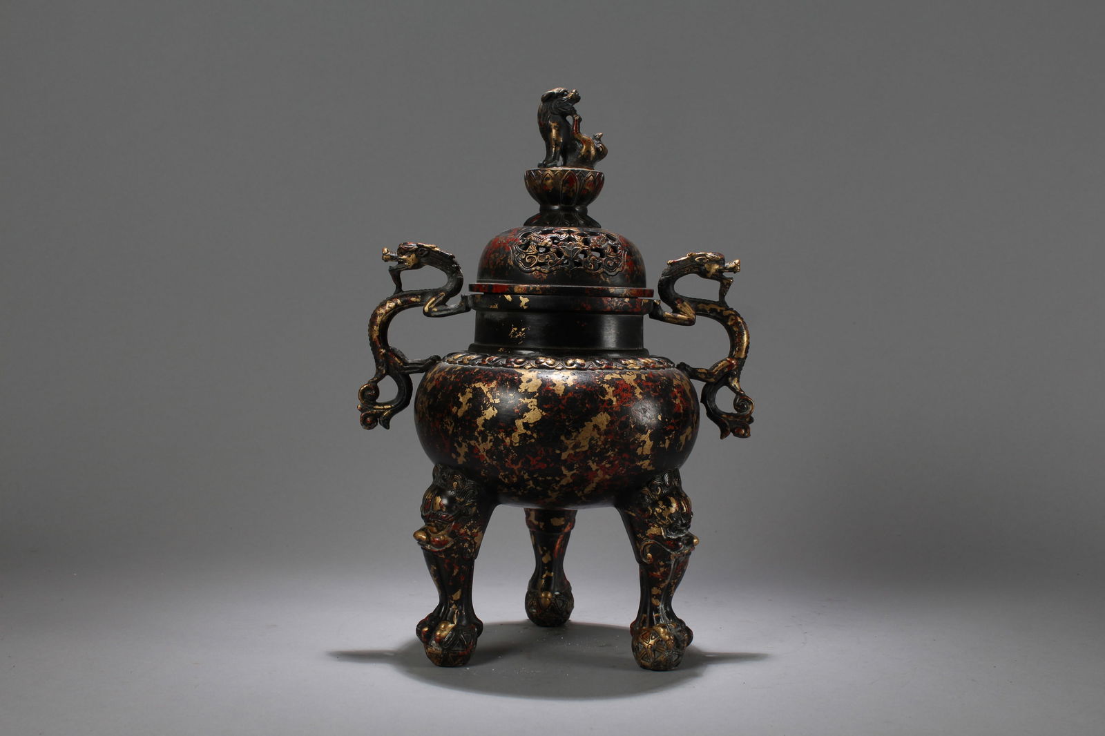 A Chinese Duo-handled Dragon-decorating Tri-podded Fortune Censer: A Chinese Duo-handled Dragon-decorating Tri-podded Fortune Censer . Height: 13 (inch). Length: 8.5 (inch).