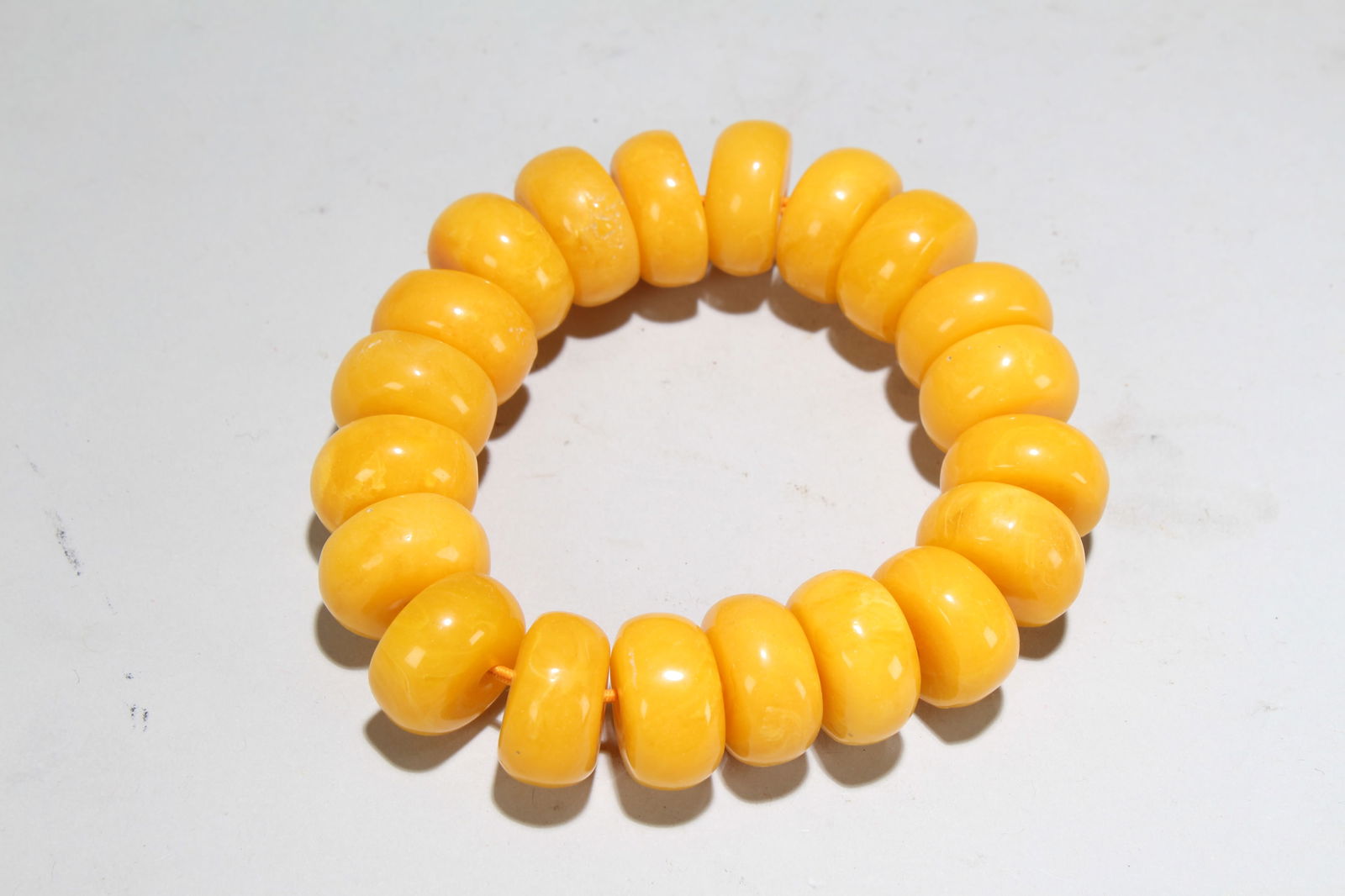 A Chinese Bracelet Display: A Chinese Bracelet Display . Opening Diameter: 0.75 (inch).