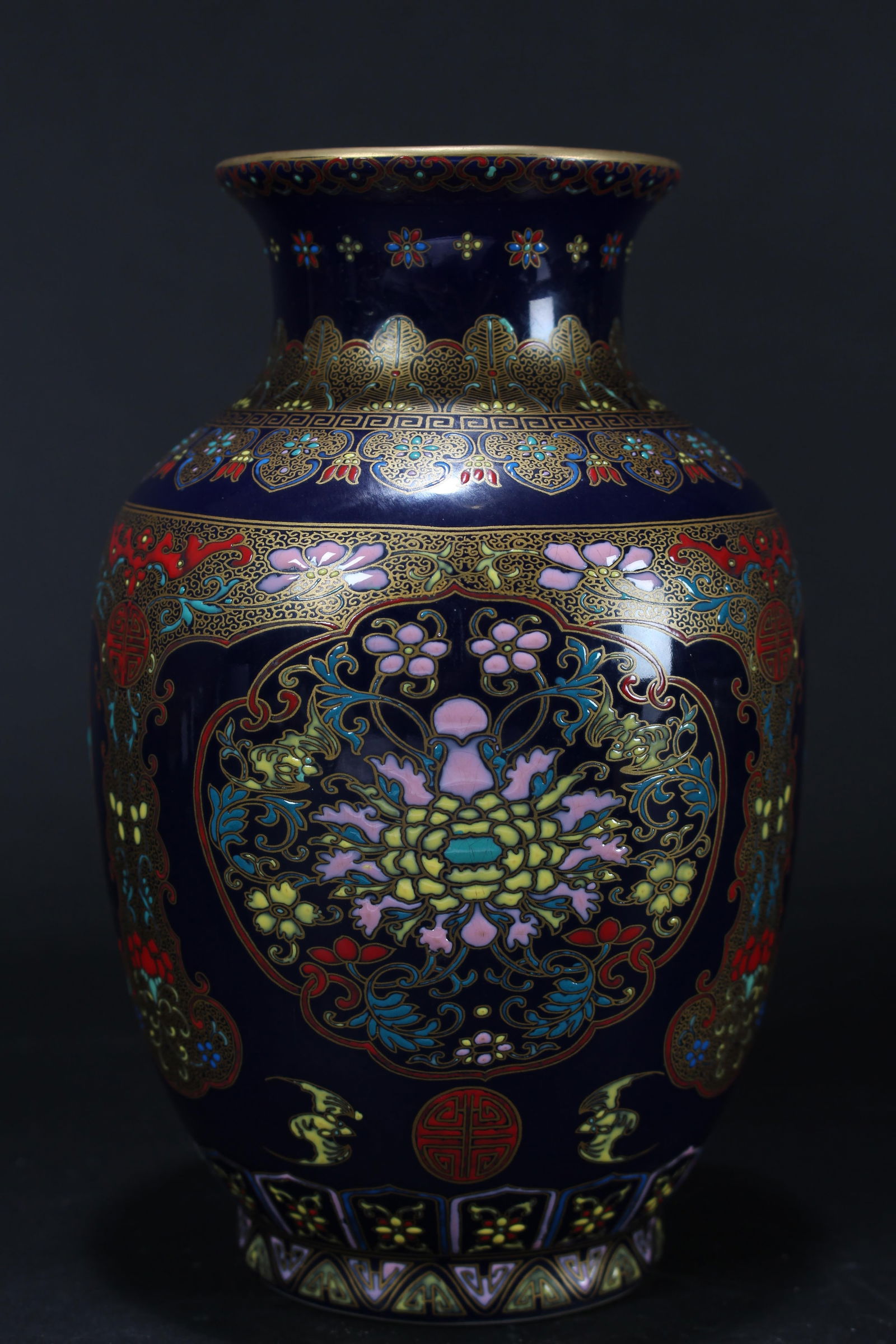 A Chinese Bat-framing Flower-blossom Massive Porcelain Vase: A Chinese Bat-framing Flower-blossom Massive Porcelain Vase. Height: 8 (inch). Opening Diameter: 3.25 (inch).