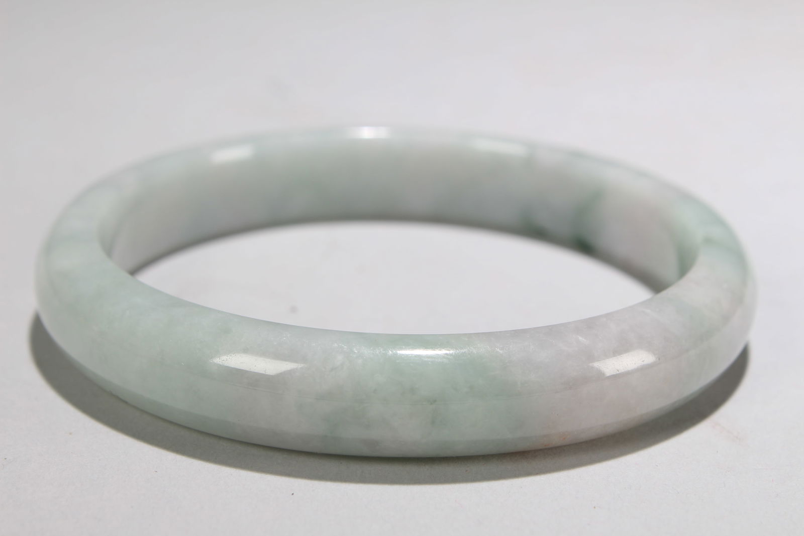 A Chinese Bangle: A Chinese Bangle. Opening Diameter: 2.75 (inch).