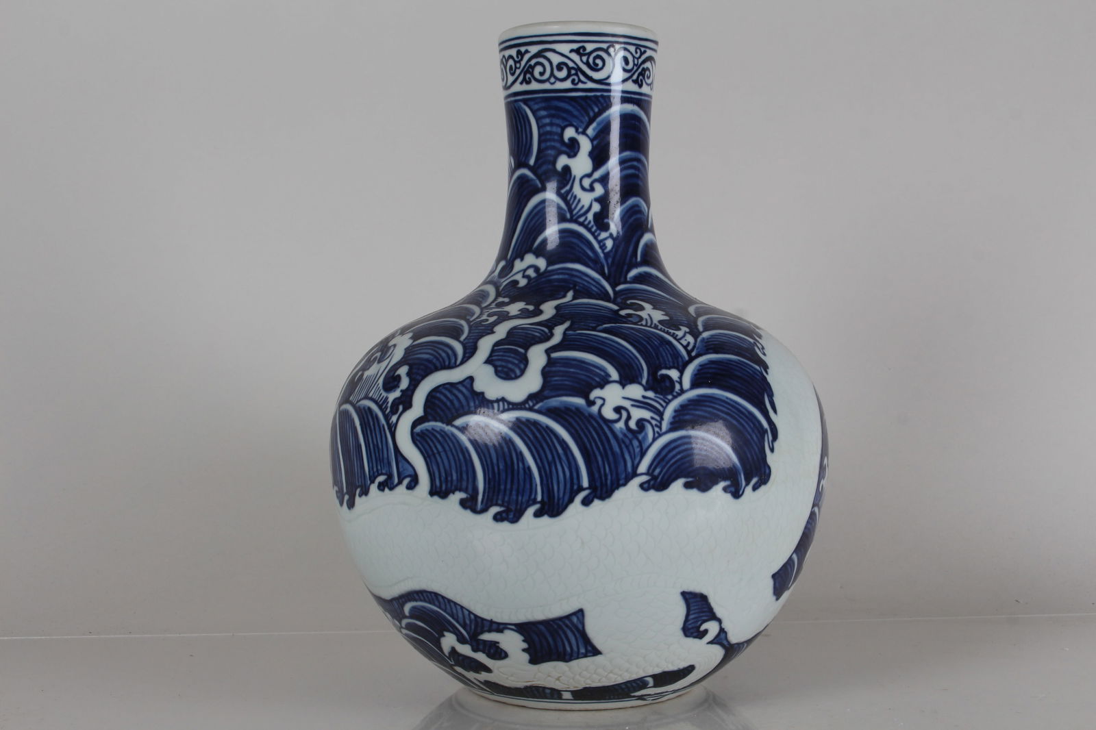 A Chinese Dragon-decorating Blue and White Porcelain Fortune Vase: A Chinese Dragon-decorating Blue and White Porcelain Fortune Vase . Height: 18.25 (inch).