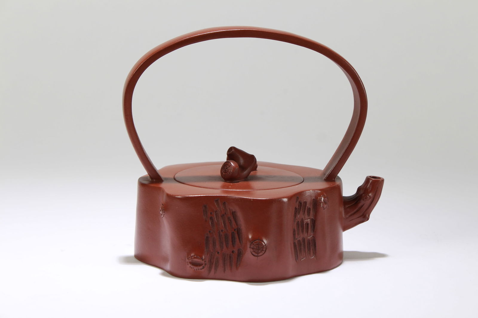 A Chinese Root-symbol High-handled Nature Fortune Tea Pot: A Chinese Root-symbol High-handled Nature Fortune Tea Pot. Height: 5.5 (inch). Length: 6 (inch).