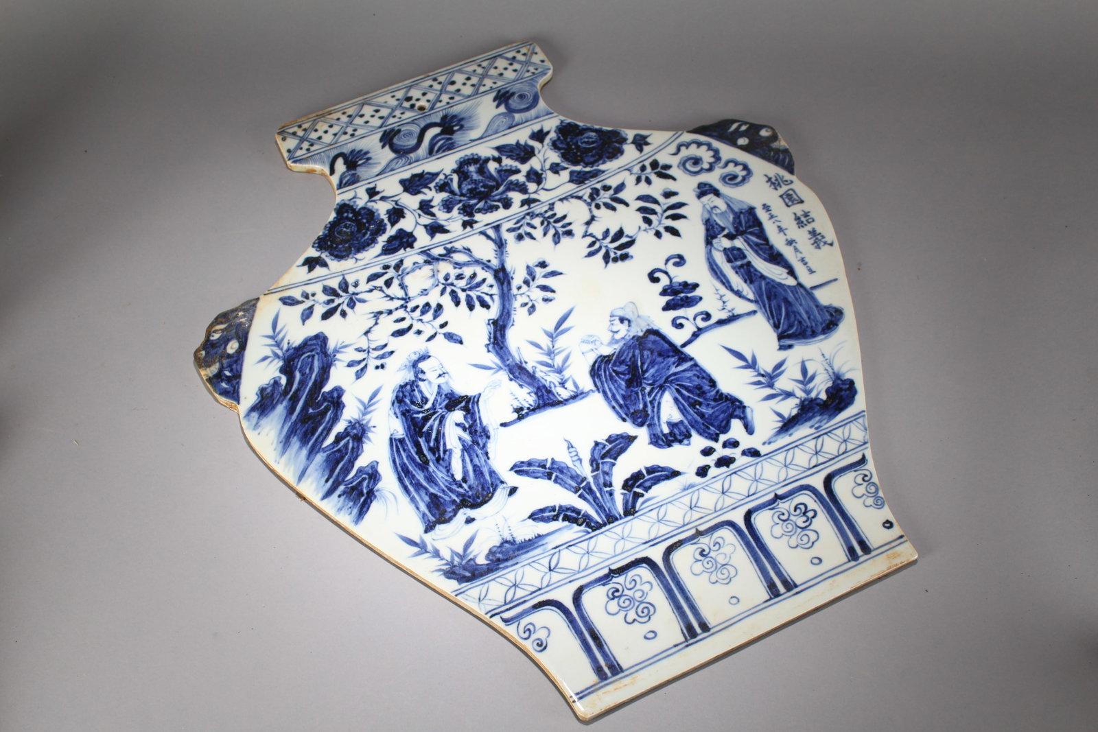 A Chinese Blue and White Duo-opening Porcelain Flat Vase: A Chinese Blue and White Duo-opening Porcelain Flat Vase. Height : 0.25 (inch). Width : 22.5 (inch). Length : 20 (inch).