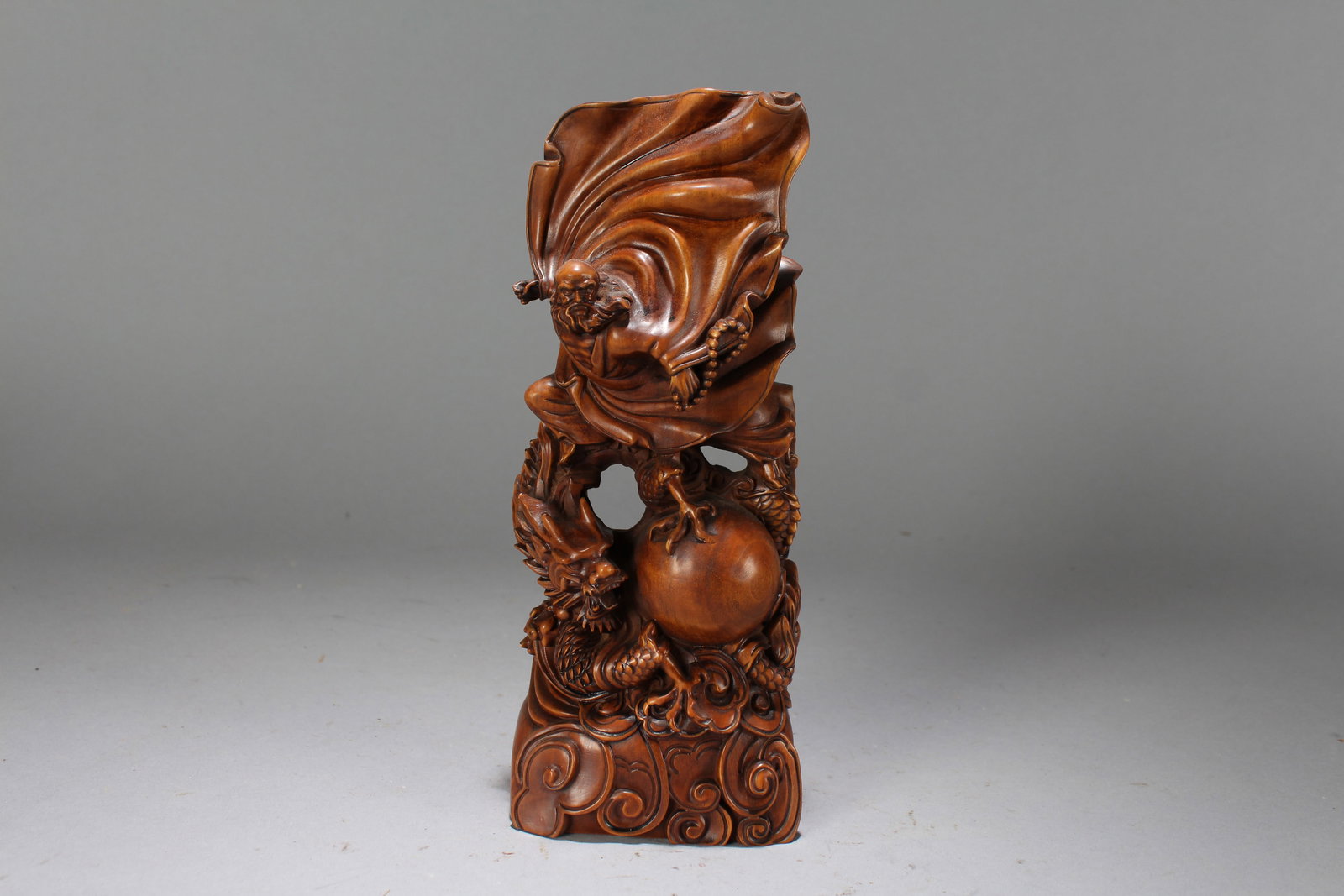 A Chinese Story-telling Fortune Buddha Statue: A Chinese Story-telling Fortune Buddha Statue. Height : 8 (inch). Width : 3 (inch). Length : 1.5 (inch).