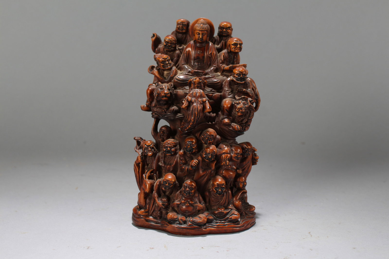 A Chinese Story-telling Fortune Buddha Statue: A Chinese Story-telling Fortune Buddha Statue. Height : 6.25 (inch). Width : 4 (inch). Length : 2.25 (inch).