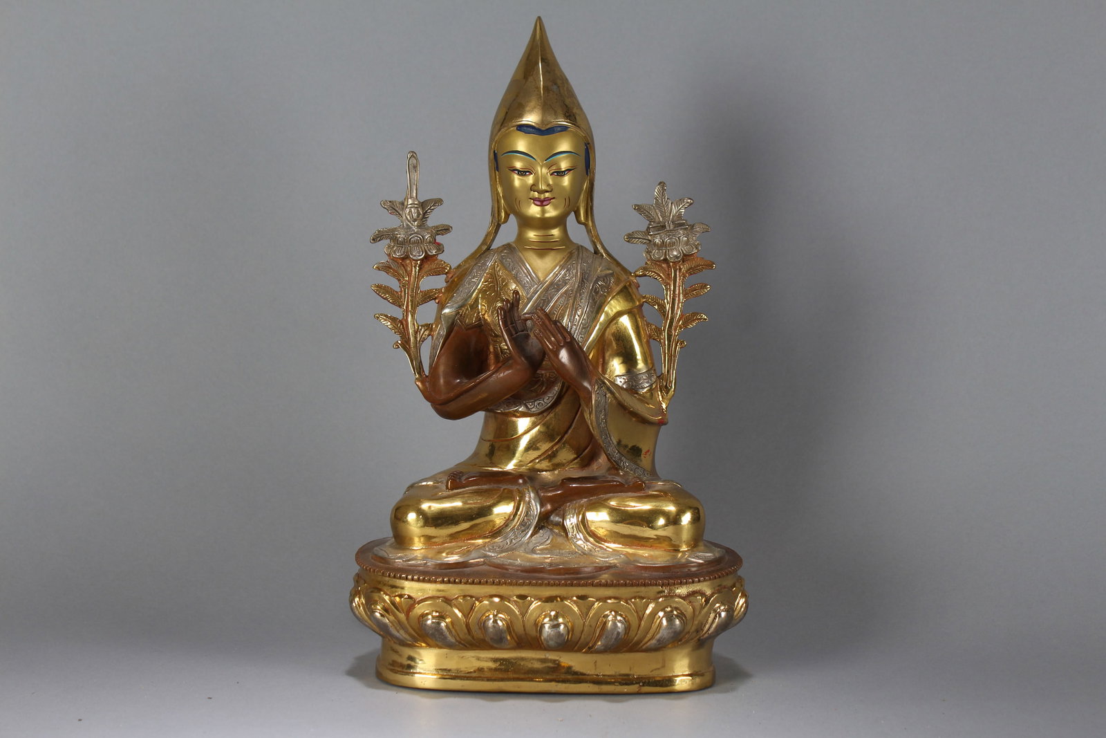 A Chinese Religious Gilt Fortune Buddha Statue: A Chinese Religious Gilt Fortune Buddha Statue. Height : 13.25 (inch). Width : 7.75 (inch). Length : 5 (inch).