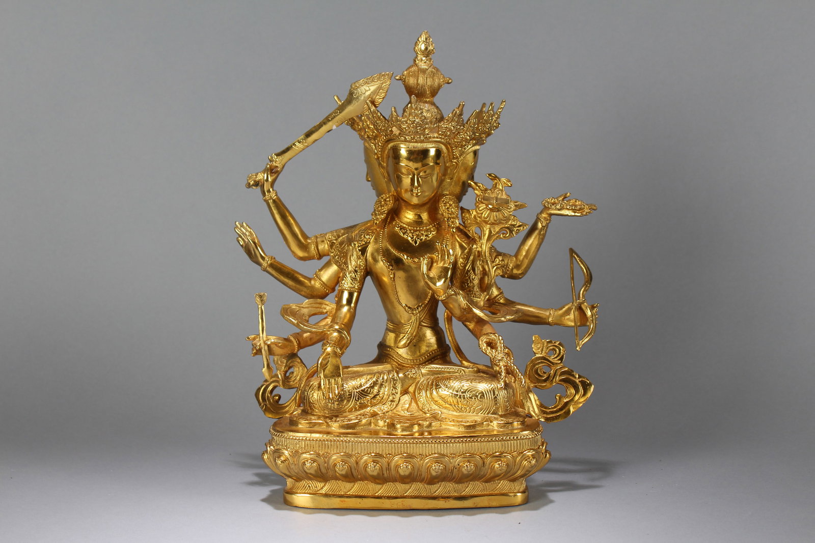 A Chinese Religious Gilt Fortune Buddha Statue: A Chinese Religious Gilt Fortune Buddha Statue. Height : 12.5 (inch). Width : 7.25 (inch). Length : 5 (inch).