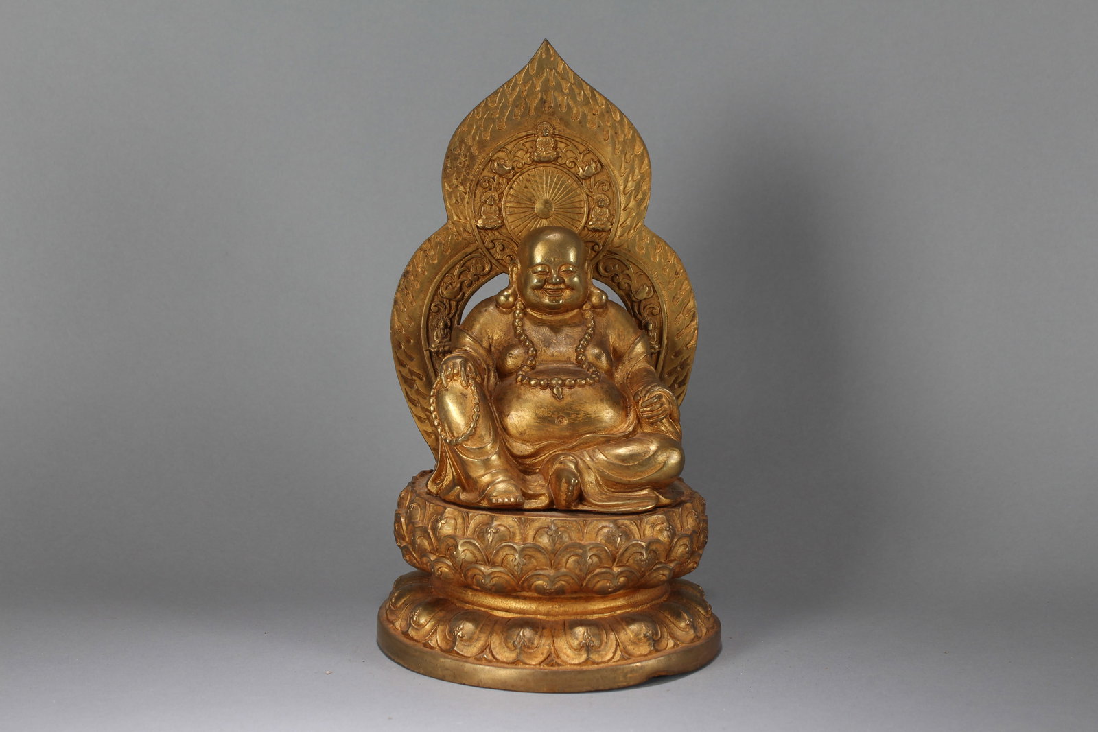 A Chinese Religious Gilt Happy Buddha Statue: A Chinese Religious Gilt Happy Buddha Statue. Height : 11.5 (inch). Opening Diameter : 6.25 (inch).
