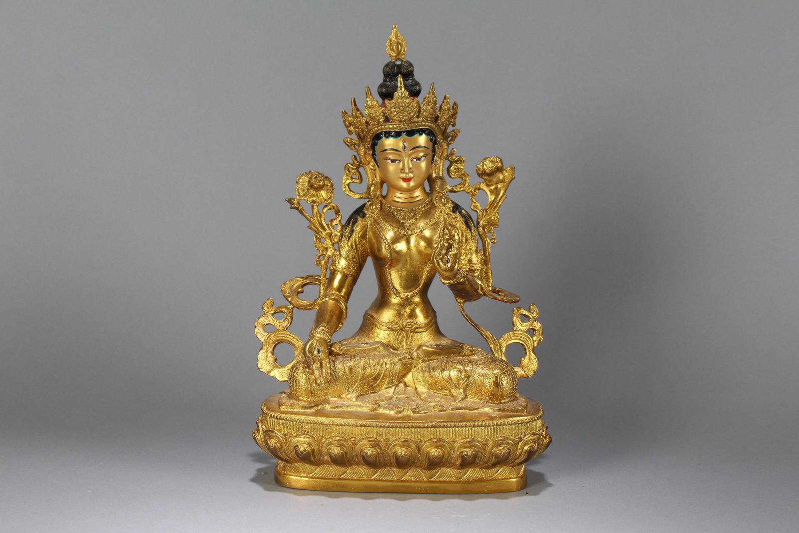 A Chinese Gilt Religious Buddha Statue: A Chinese Gilt Religious Buddha Statue. Height : 11.5 (inch). Width : 7 (inch). Length : 5 (inch).