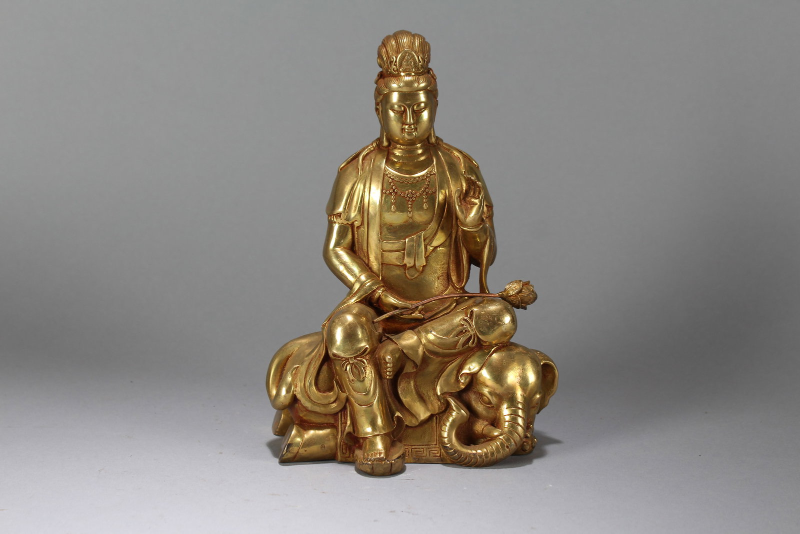 A Chinese Anicent-framing Vividly-detailed Gilt Fortune Buddha Statue: A Chinese Anicent-framing Vividly-detailed Gilt Fortune Buddha Statue. Height : 8.25 (inch). Width : 6 (inch). Length : 3.75 (inch).