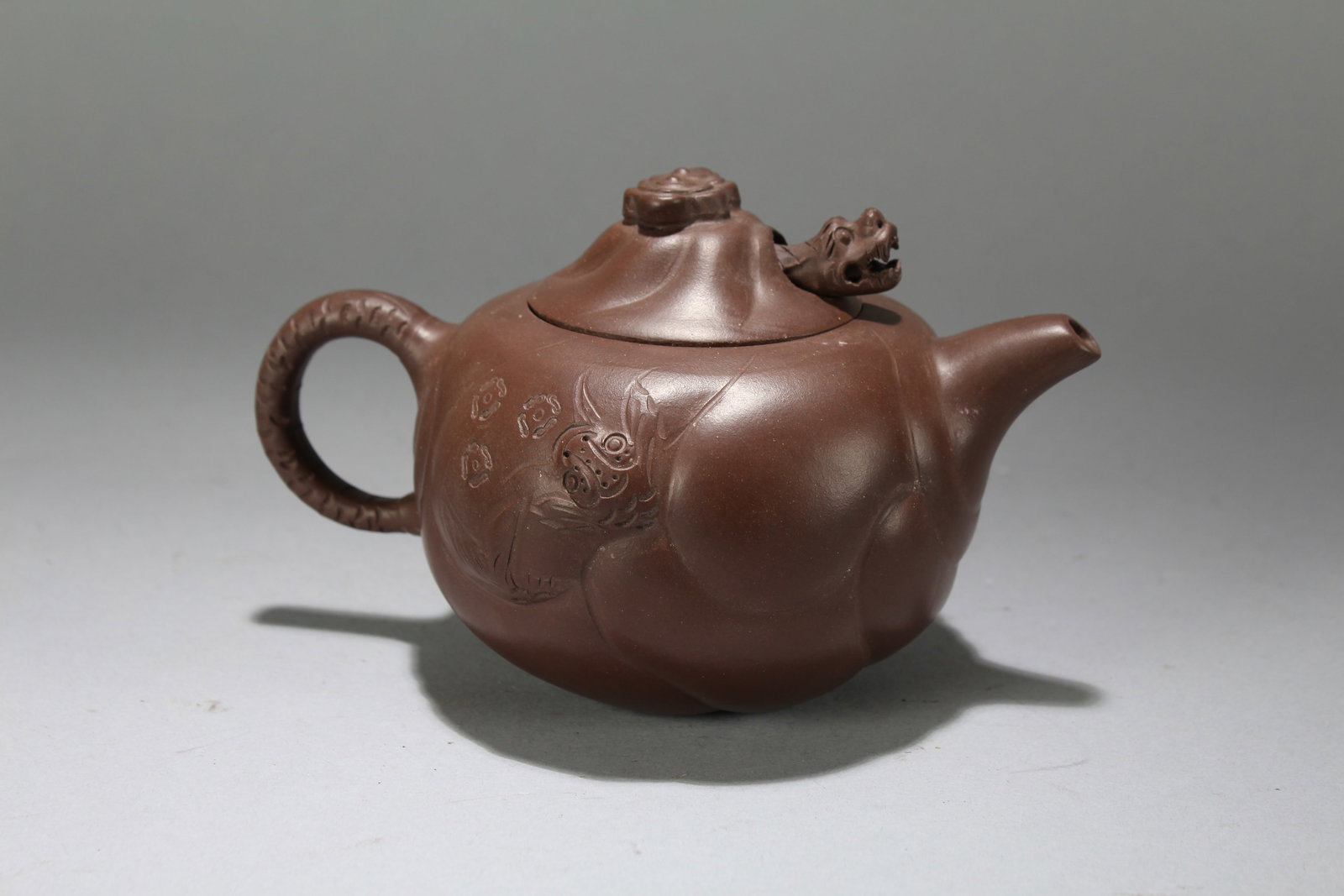 A Chinese Myth-beast Lidded Tea Pot: A Chinese Myth-beast Lidded Tea Pot. Height : 4 (inch). Width : 6.5 (inch). Opening Diameter : 4.5 (inch).