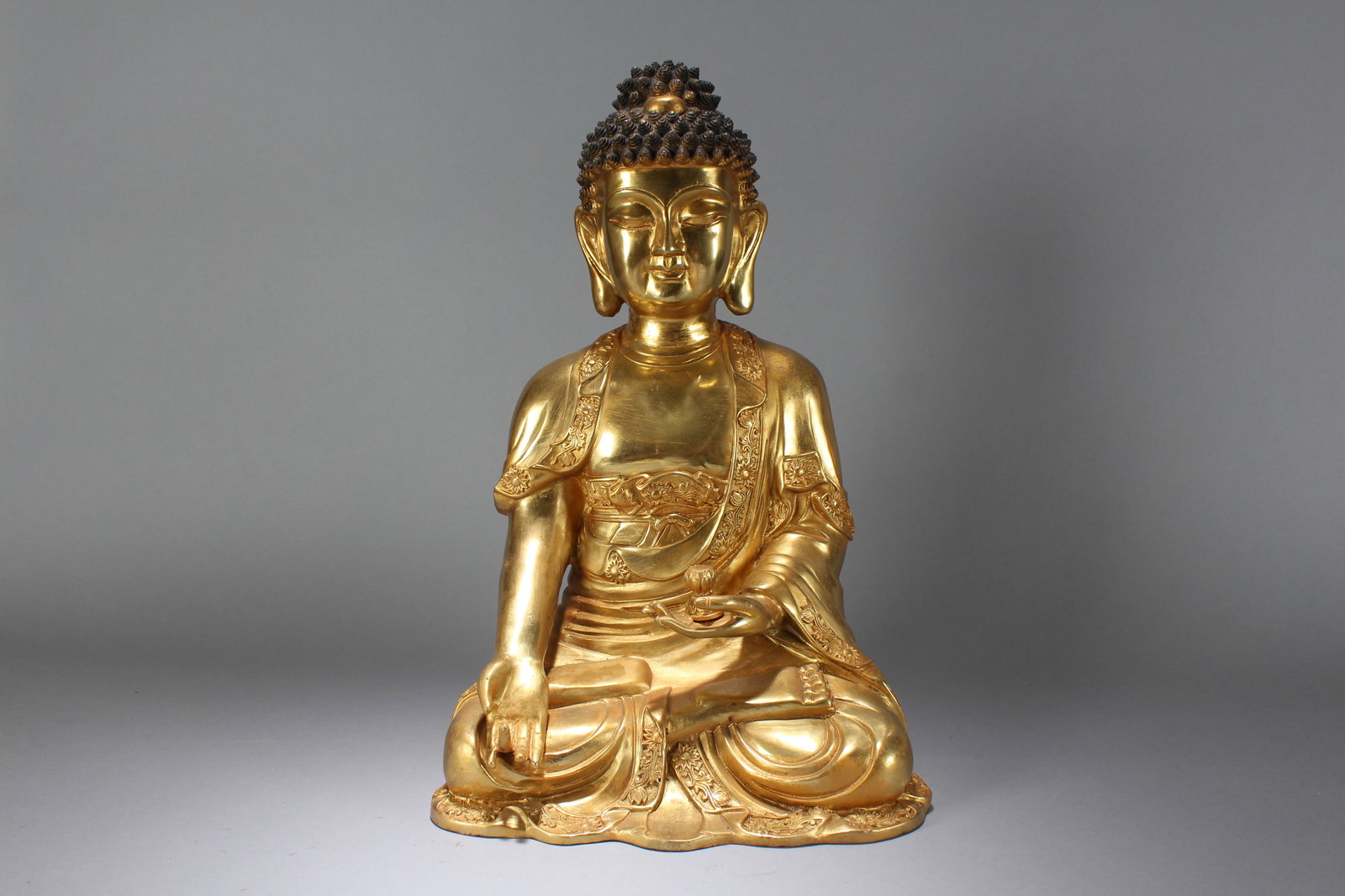 A Chinese Anicent-framing Massive Gilt Religious Fortune Statue: A Chinese Anicent-framing Massive Gilt Religious Fortune Statue. Height : 16.5 (inch). Width : 10.5 (inch). Length : 7.5 (inch).