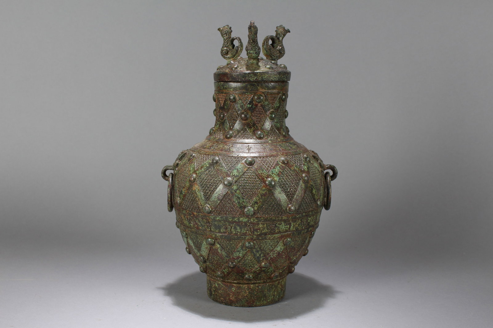 A Chinese Anicent-framing Bronze Vessel: A Chinese Anicent-framing Bronze Vessel. Height : 11.5 (inch). Opening Diameter : 6 (inch).