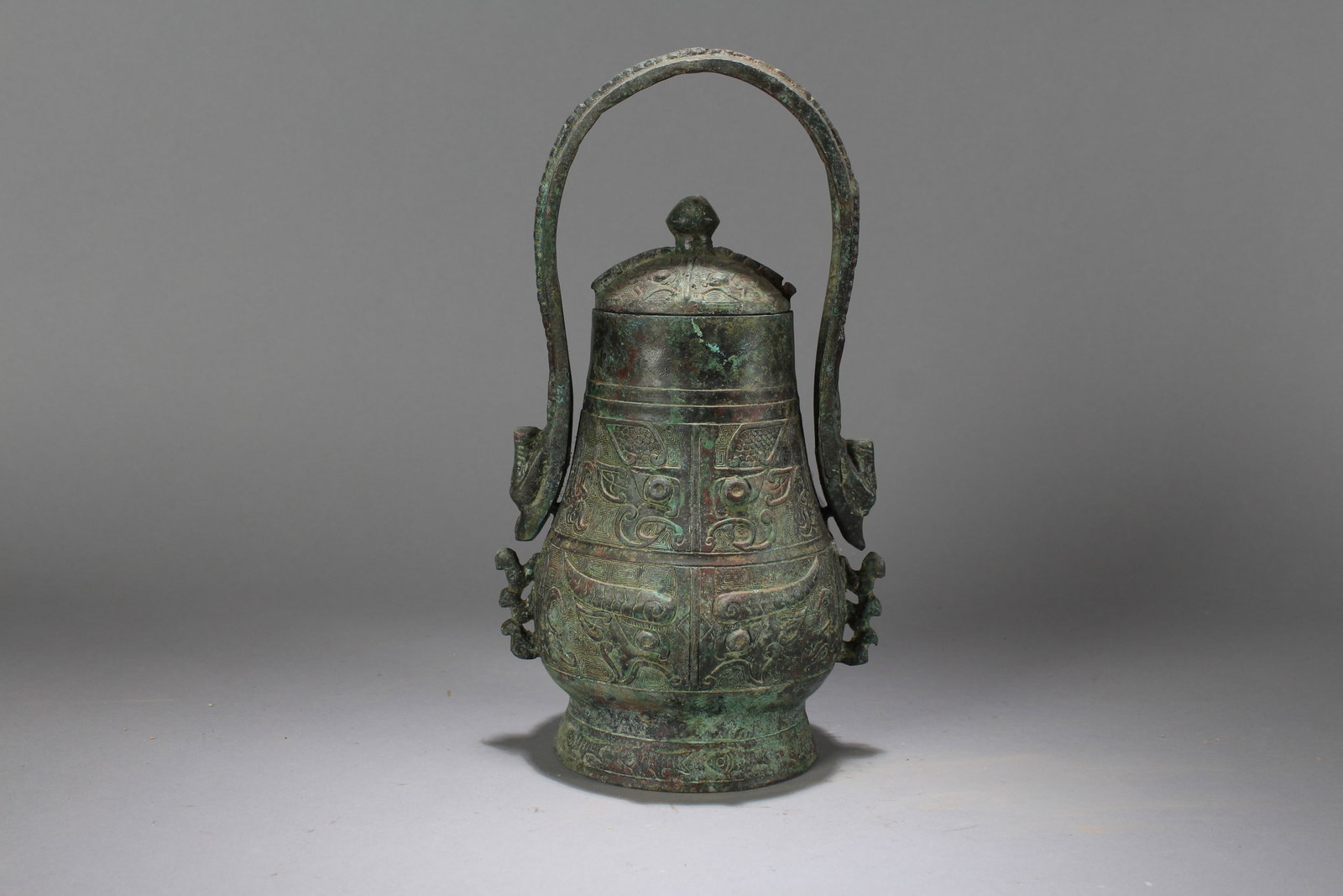 A Chinese Anicent-framing Religious Fortune Bronze Vessel: A Chinese Anicent-framing Religious Fortune Bronze Vessel. Height : 11 (inch). Opening Diameter : 6 (inch).