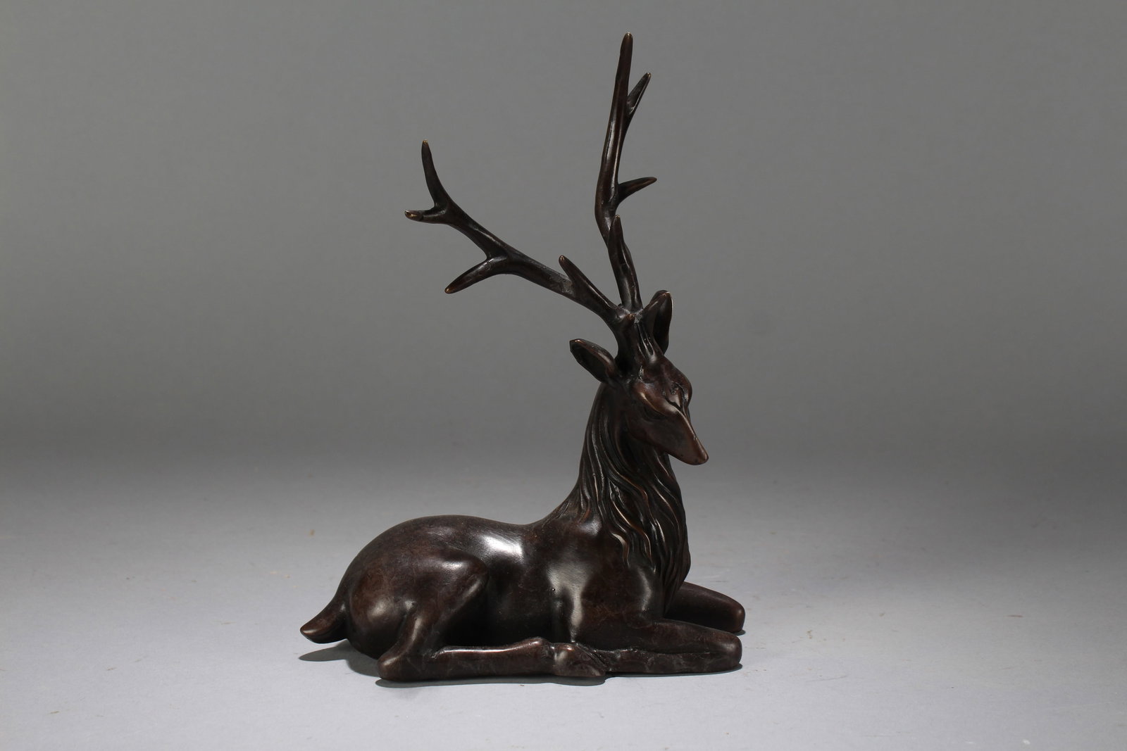 A Chinese Religious Vividly-detailed Deer-portrait Statue: A Chinese Religious Vividly-detailed Deer-portrait Statue. Height : 8.25 (inch). Width : 6 (inch). Length : 2.5 (inch).