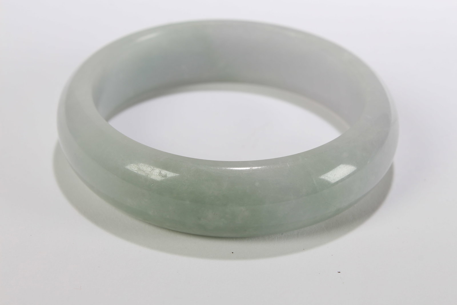 A Chinese Bangle Display: A Chinese Bangle Display . Opening Diameter: 3 (inch).