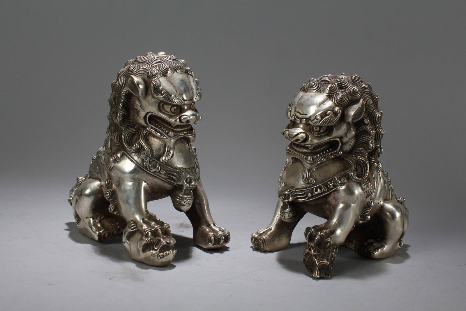 A Pair of Chinese Fortune Myth-beast Statues: A Pair of Chinese Fortune Myth-beast Statues. Height: 6.25 (inch). Length: 6 (inch). Width: 3.5 (inch).